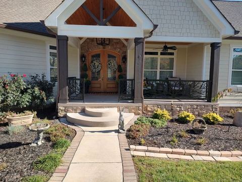 Custom steel railing fabricated, painted and installed for front porch.