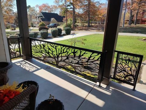 Custom steel railing fabricated, painted and installed for front porch.